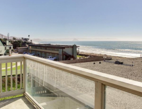 Oceanfront Condo Escape with Grill, Walk to Beach!